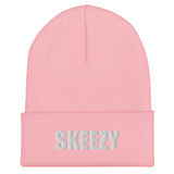 Baby pink cuffed beanie with SKEEZY embroidered in white on the cuff, front view