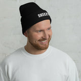 Man wearing the black Skeezy cuffed beanie with white SKEEZY embroidery