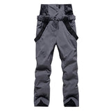 Highline Women's Suspender Snow Pant in Charcoal with black suspenders, front view, laid flat