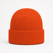 Cuffed Logo Beanie in Ember — Skeezy studio render, front view
