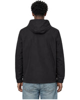 Rewind Water-Resistant Anorak in Blackout, worn by a model, back view with the hood down
