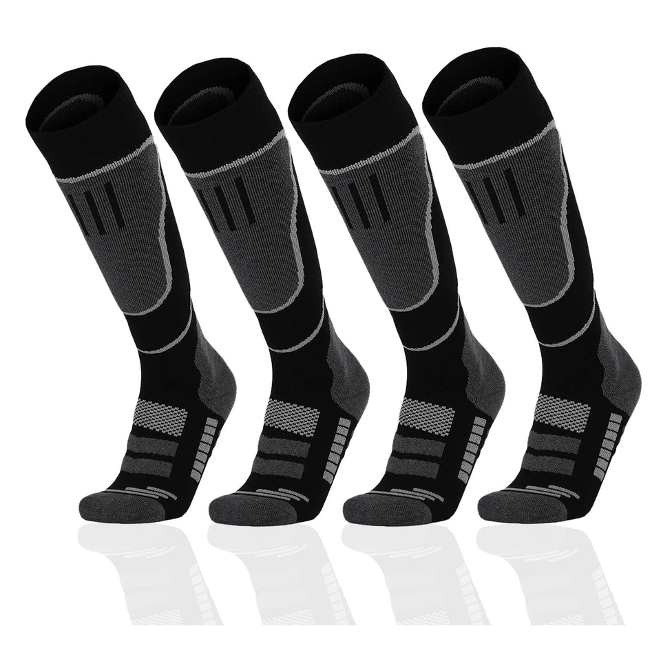 Knee-High Snow Socks 2 Pack in Blackout: two pairs of black knee-high socks with charcoal shin panels, heels and toes